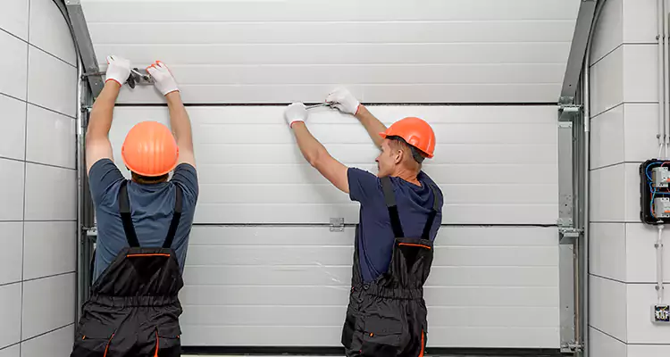 Garage Door Bottom Panel Repair in Palm City, FL
